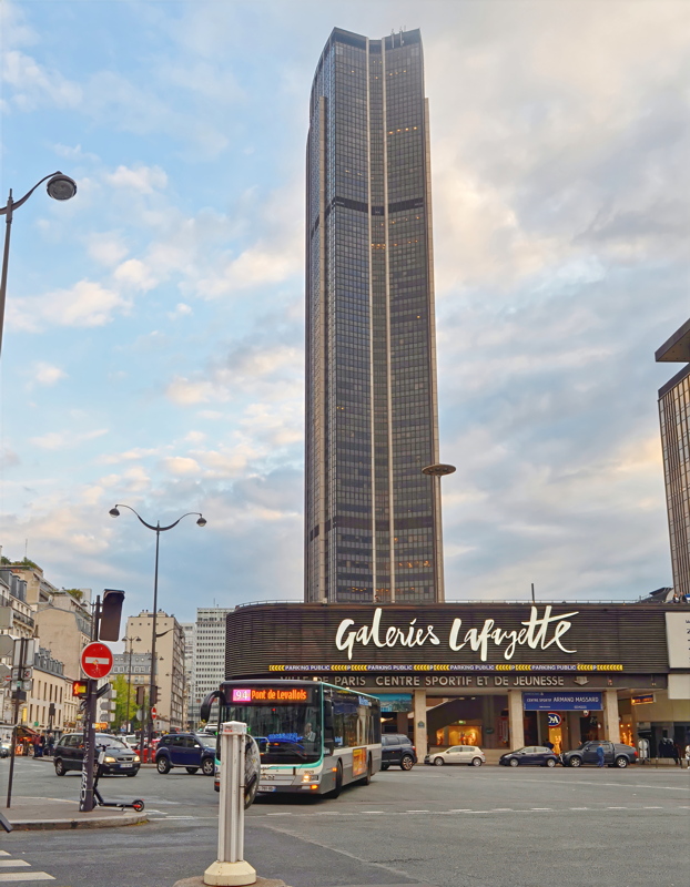 26 - The tall dark building is the Montparnasse Tower located in Paris